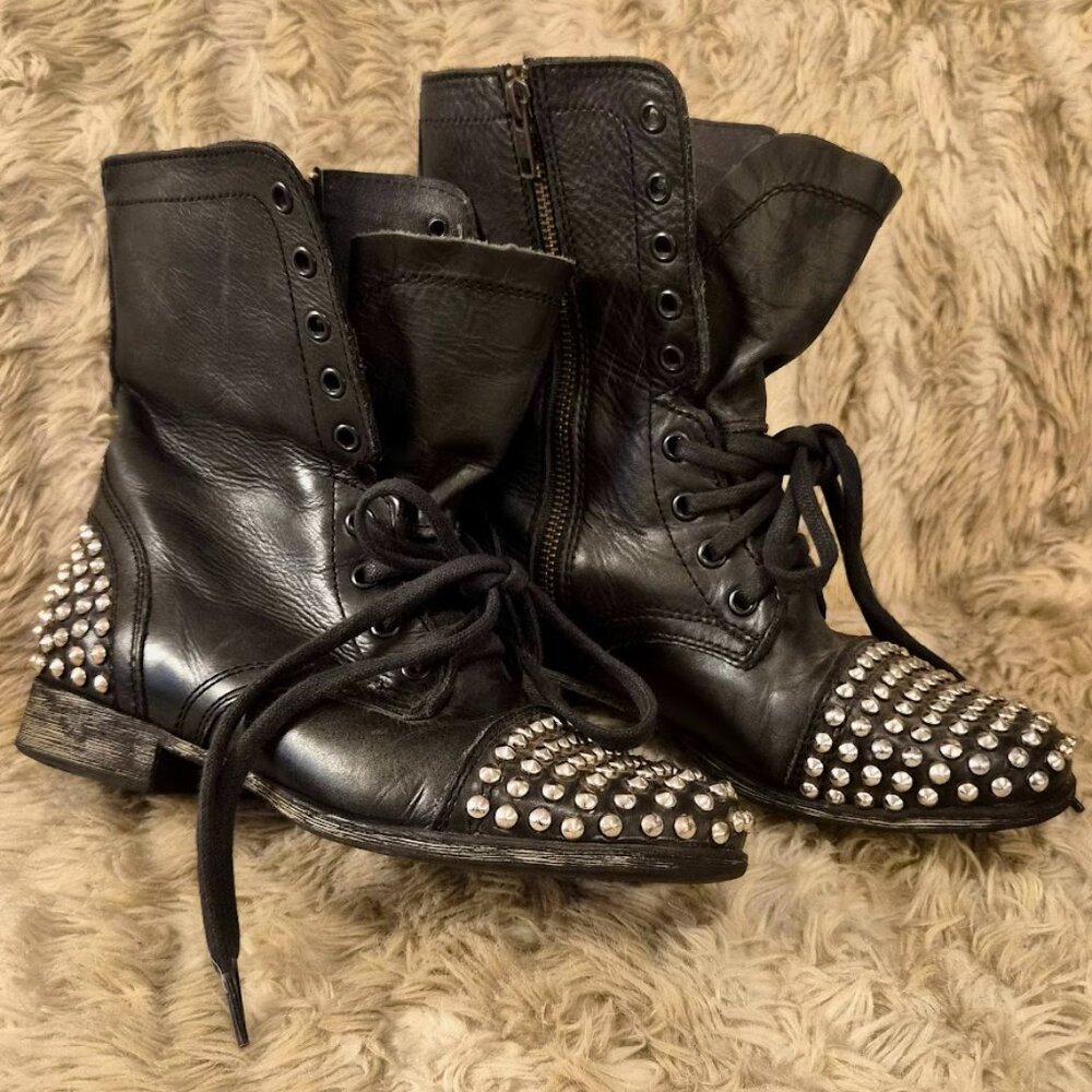Bold studded black punk-rocker combat boots by Steve Madden